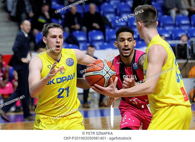 L-R RADOVAN KOURIL (Opava), OLIVIER HANLAN (Bonn), JAKUB SLAVIK (Opava) in action during the 14th round of group B, basketball Champions League