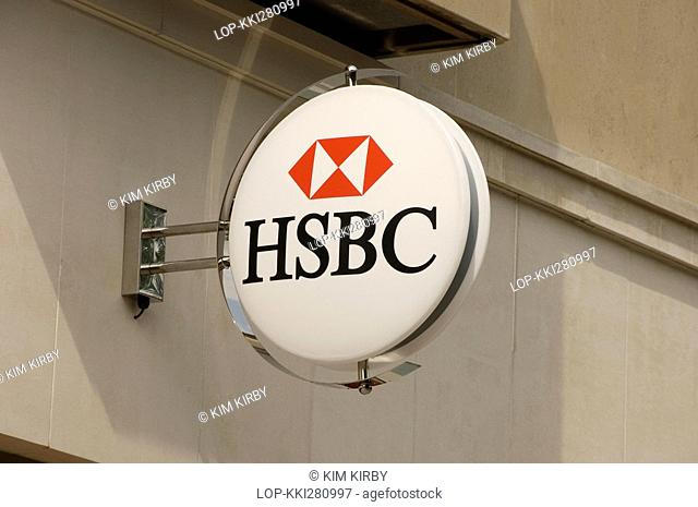 England, North Yorkshire, York, An HSBC bank sign mounted to a wall outside a branch of the bank