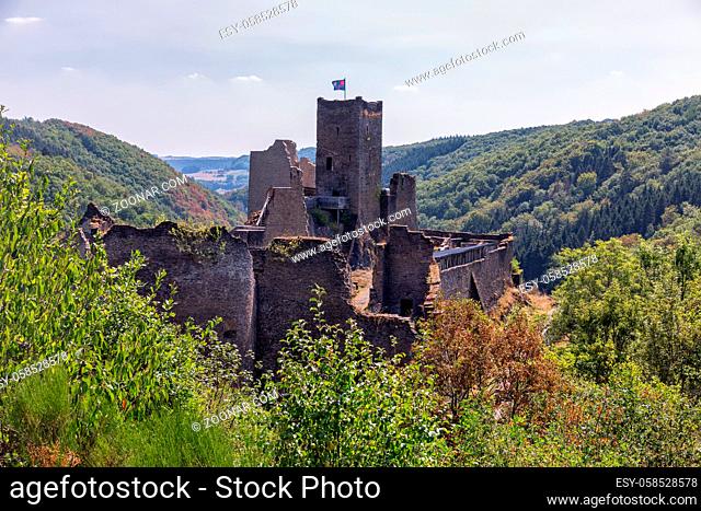 Brandenbourg, Luxembourg - August 22, 2018: Medieval ruin of Brandenbourg castle at hill in Ardennes 70 meter above village of Brandenbourg