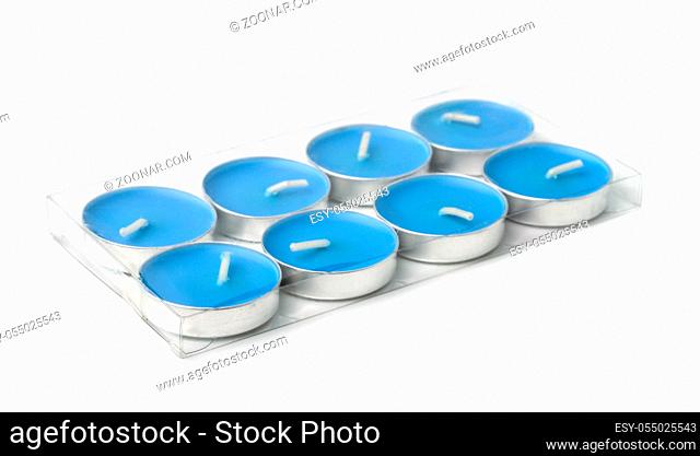 Plastic pack of tealight candles isolated on white