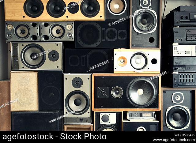 Music sound speakers hanging on the wall in retro vintage style, stacked sound boxes modern vintage