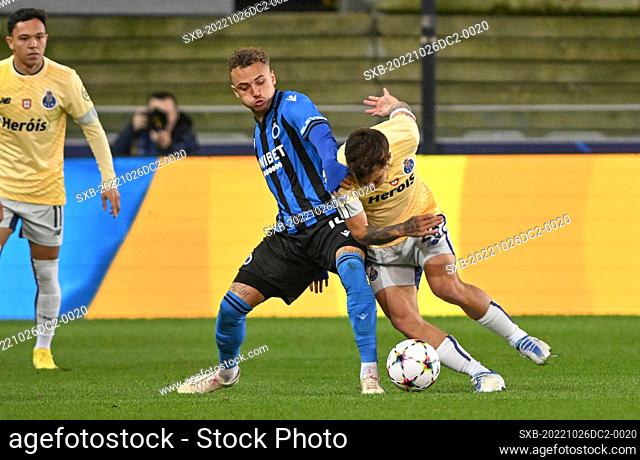 Noa Lang (10) of Club Brugge pictured with Otavio C (25) of FC Porto during a soccer game between Club Brugge KV and FC Porto during the fifth matchday in group...