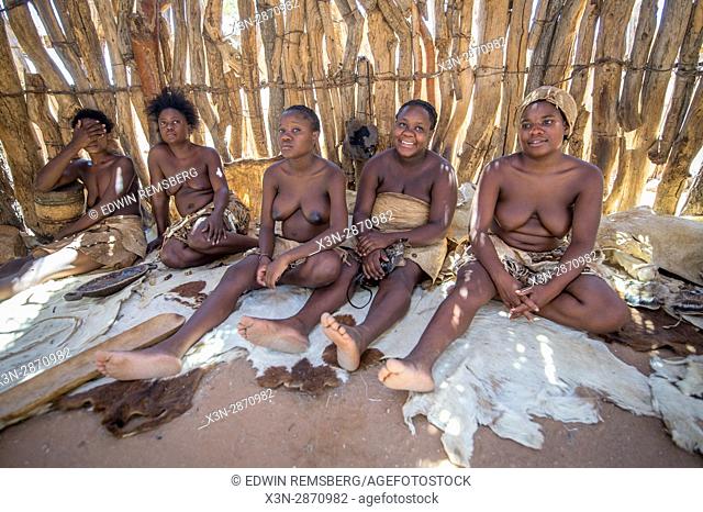 Damaraland women working in a hut at the Damara Living Museum in Twyfelfontein, located in the southern region of Namibia, Africa