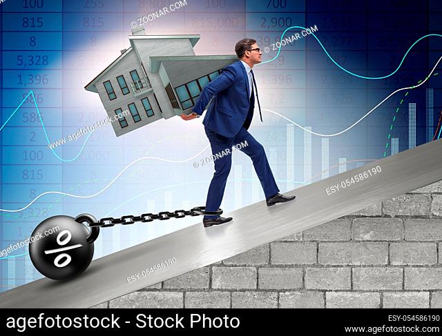 The businessman in mortgage debt financing concept