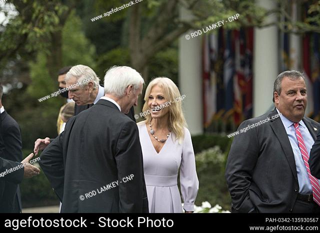Kellyanne Conway, right, talks with other guests following President Donald Trump's announcement of Amy Coney Barrett, 48