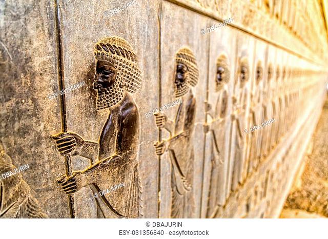 Guardians also known as the Immortals holding a spear, relief detail on the stairway facade of the Apadana at the old city Persepolis