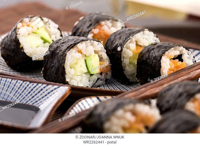 Sushi - Salmon rolls served on a plate