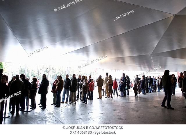 People queuing at the entrance of Caixaforum. Madrid, Spain