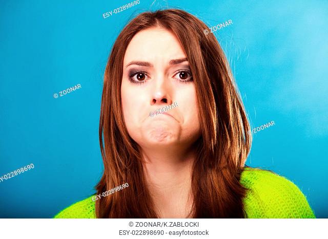 people concept - teenage girl making silly face