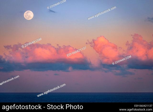 A beautiful setting moon over the Atlantic Ocean. Florida, USA. Color image