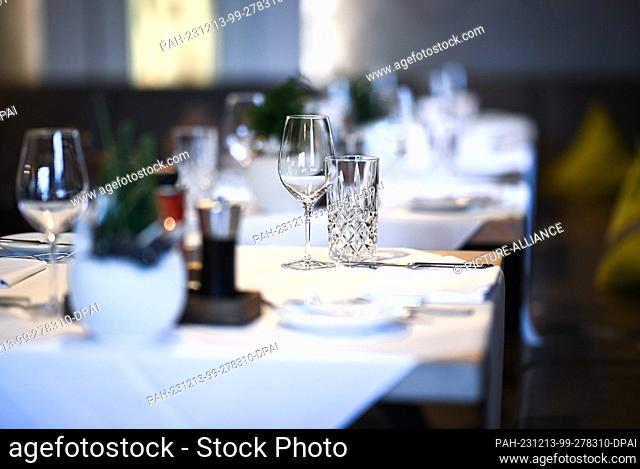 12 December 2023, Baden-Württemberg, Immenstaad am Bodensee: Several tables are already set at the Hotel and Restaurant Heinzler am See