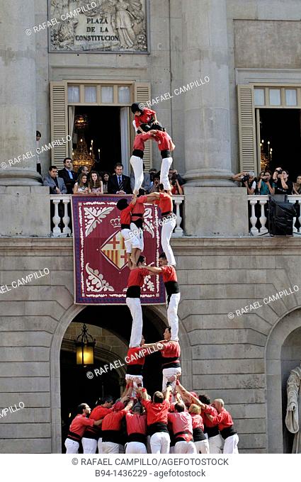 'Castellers' typical human towers in Catalonia, La Merce festival, Sant Jaume square, Barcelona, Catalonia, Spain