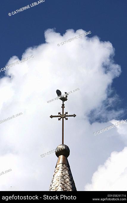 Bell tower. Cross and weather vane. Church of Notre-Dame de la Gorge. Les Contamines-Montjoie. Haute-Savoie. Auvergne Rhône-Alpes. France. Europe