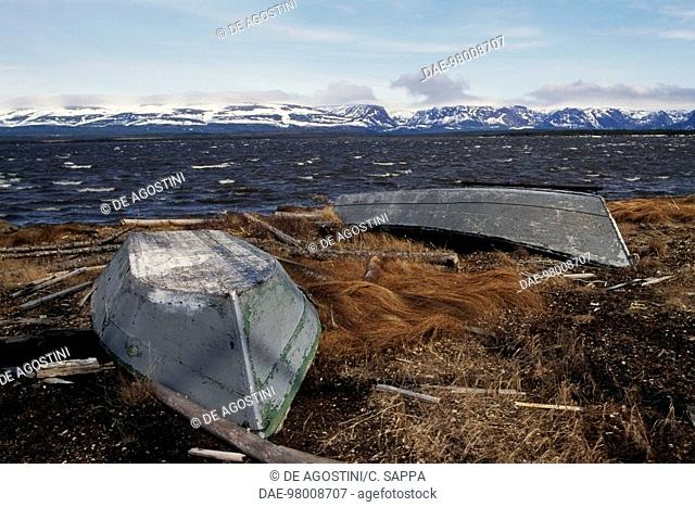 Overturned boats, the background Long Range mountains, near Port Aux Basques, Newfoundland, Canada