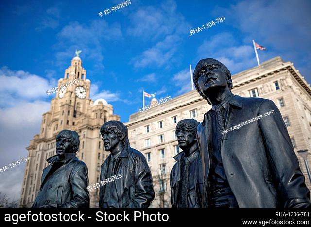 The bronze statue of the Beatles stands on Liverpool Waterfront, Liverpool, Merseyside, England, United Kingdom, Europe