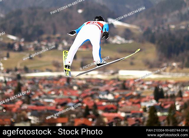 04 March 2021, Bavaria, Oberstdorf: Nordic skiing: World Cup, combined, individual, large hill/10 km, men, jump. Akito Watabe from Japan in action