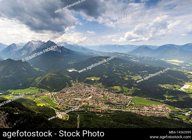View from the Viererspitze (2054m) on the village Mittenwald in the Bavarian Alps, above the market, the Kranzberg, Lautersee and the Wetterstein mountains