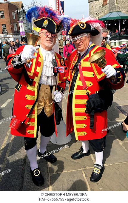 Steve Clow (67, L) and Peter Baker (67, R) from Chelmswood arrived dressed as town criers to celebrate the British Queen in Windsor, Great Britain