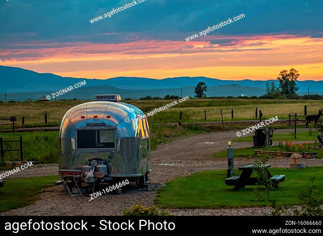 White Sulphur Springs, MT, USA - July 14, 2019: Enjoying the captivated sunset view from our RV