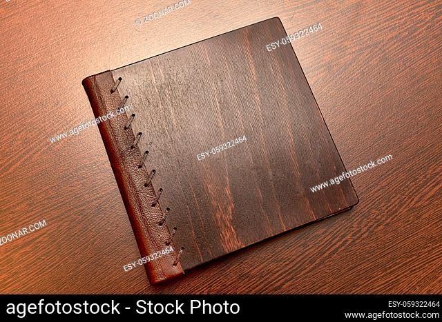 Note book with hard wooden cover