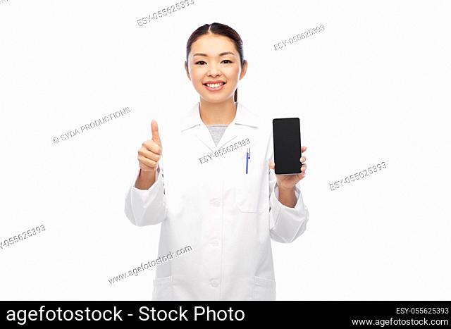 asian doctor with smartphone shows thumbs up