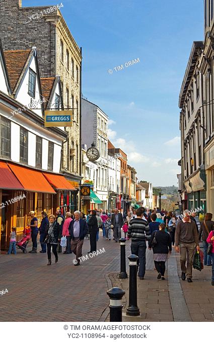 A street busy with shoppers in Bury Saint Edmunds , Suffolk , England , Great Britain , UK