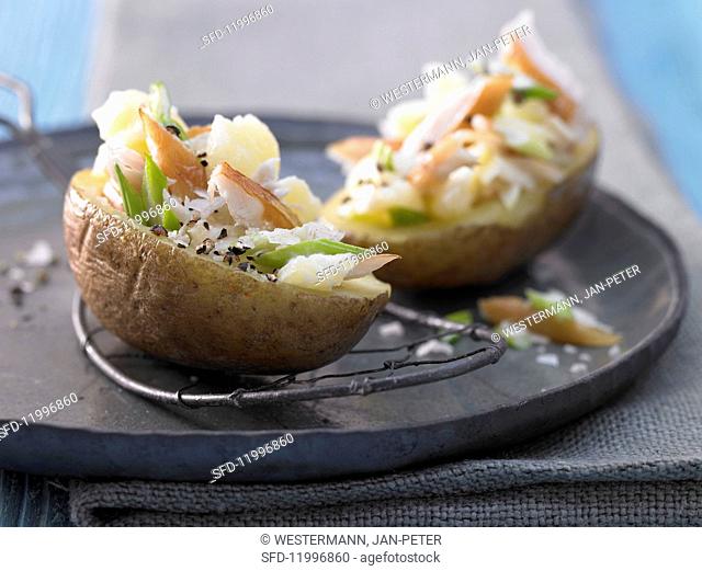 Baked potato filled with smoked mackerel