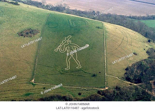 The Cerne Abbas Giant, also known as the rude man, is 180 feet high and carved into the hillside. It is debated how old the carving is