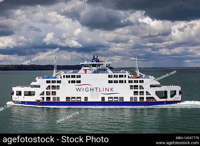 england, isle of wight, yarmouth, the wightlink portsmouth to ryde car and passenger ferry st.clare crossing the solent under cloudy skies