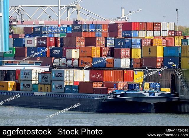 Duisburg, North Rhine-Westphalia, Germany - Duisburg port, cargo ships with containers at the container terminal in the container port