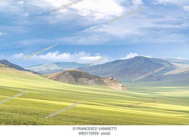 Landscape of the green Mongolian steppe under a gloomy sky, Ovorkhangai province, Mongolia, Central Asia, Asia
