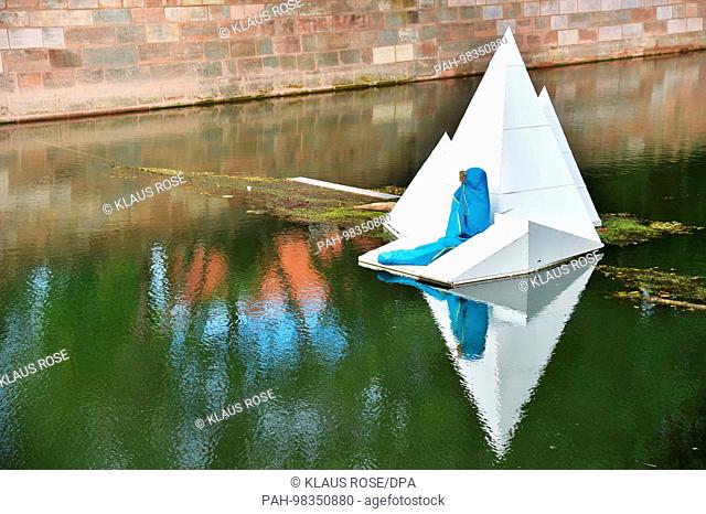 Art project ""Island Worlds"" in Nuremberg. An installation by the Krakow artist Kornel Janczy on the Pegnitz River entitled ""Return of Stars"", 04