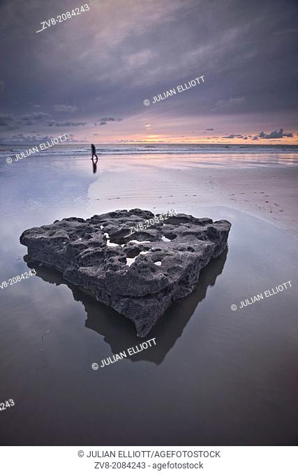 Strewn rocks across the beach at Dunraven Bay near to Southerndown on the Glamorgan Heritage Coastline