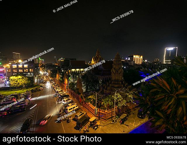riverside district downtown street in central phnom penh city cambodia at night