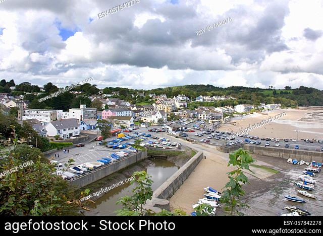 Saundersfoot. A seaside resort town in Pembrokeshire, Wales. . Saundersfoot is a fishing village located in the heart of the Pembrokeshire Coast National Park...