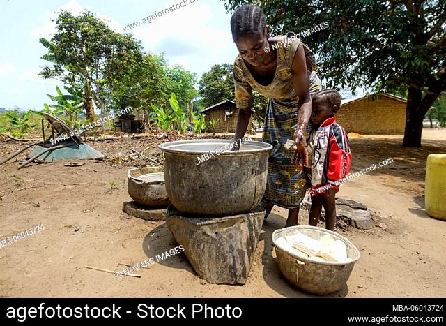 Woman preparing food, Democratic Republic of the Congo, Africa