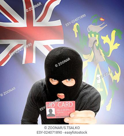 Hacker with flag on background holding ID card in hand - Pitcairn Islands