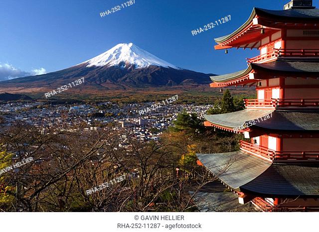 Mount Fuji capped in snow and the upper levels of a temple, Fuji-Hakone-Izu National Park, Chubu, Central Honshu, Japan, Asia