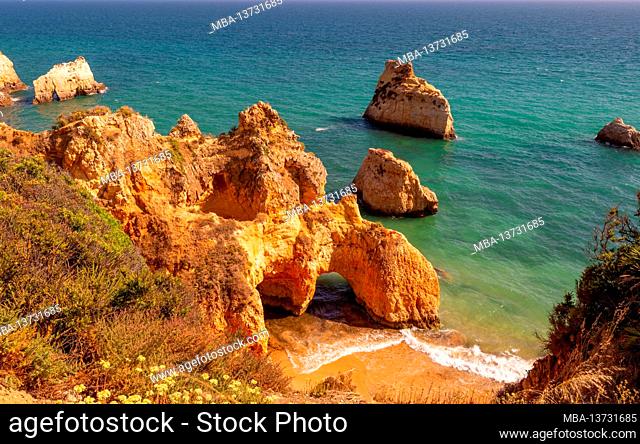 Rocky coast Praia dos três irmãos, beach near Alvor, Algarve, District Portimão, Portugal, Europe