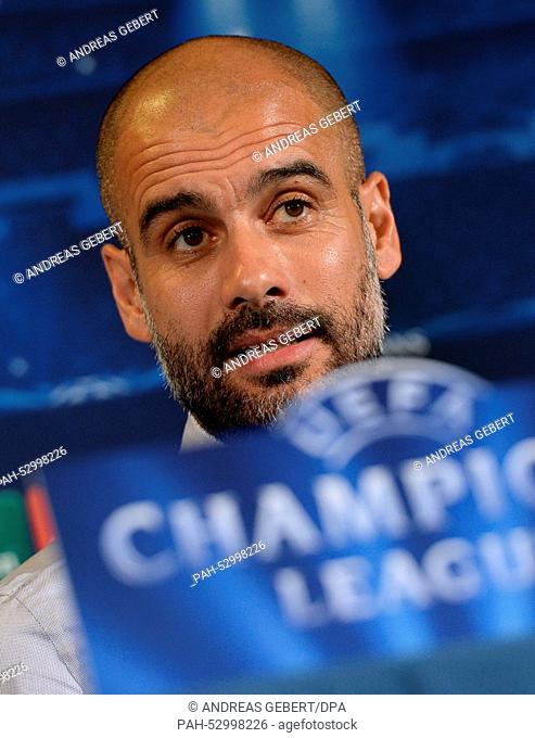 Munich's coach Pep Guardiola attends a press conference at the team hotel prior to the UEFA Champions League Group E soccer match between AS Rome and FC Bayern...