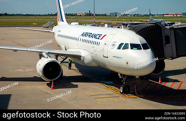 A picture of an Air France plane parked in the Warsaw Chopin Airport