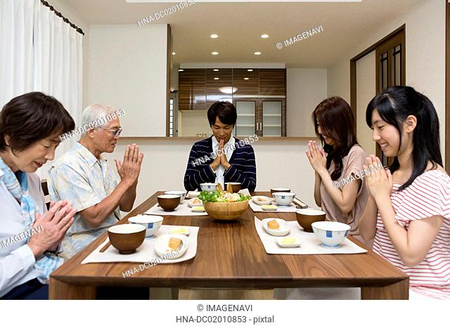 Three generation family at a dining table