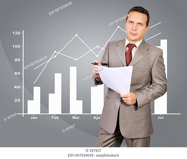 businessman with paper and chart on background