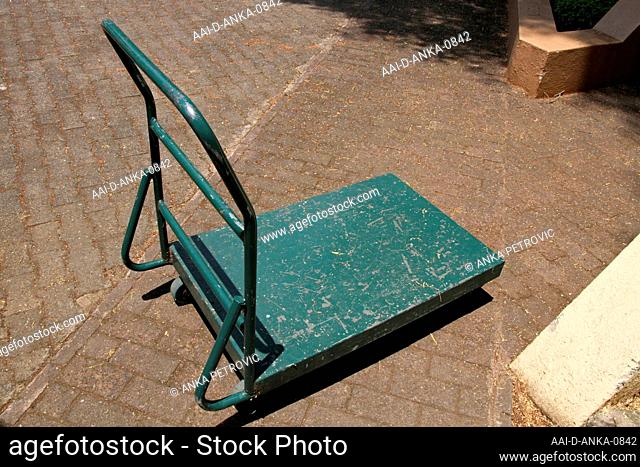 Luggage trolley on pavement in Sanbonani Resort, Hotel & Spa, Hazyview, Sabie River, Kruger National Park, Mpumalanga, South Africa