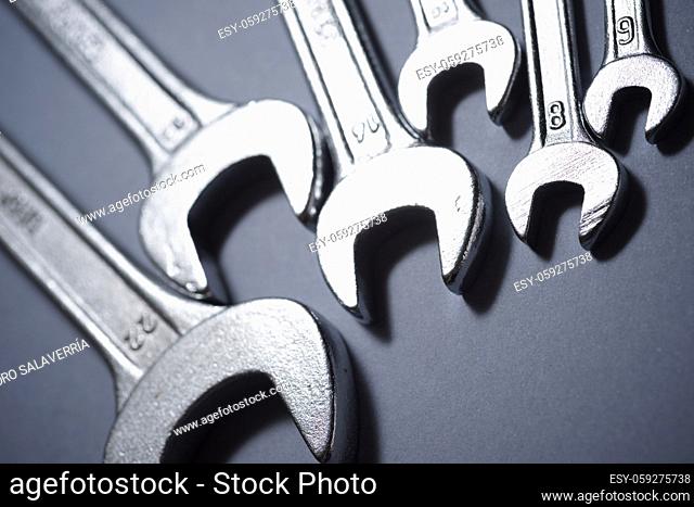 Wrenches on a gray table