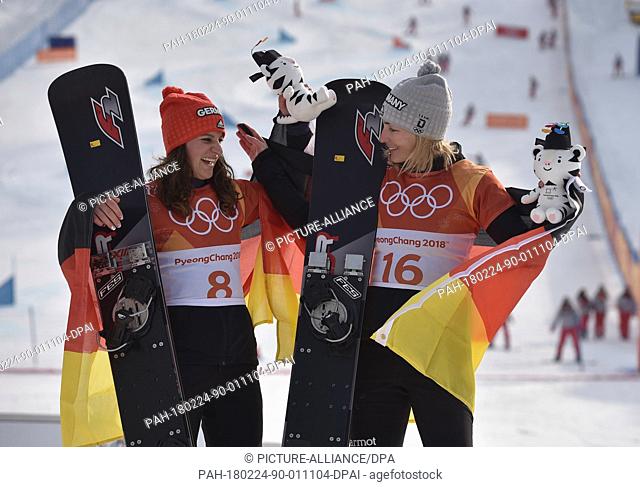 Germany's Selina Joerg (r, silver) and Ramona Theresia Hofmeister (l, bronze) celebrate their performances at the women's parallel giant slalom in Bokwang...