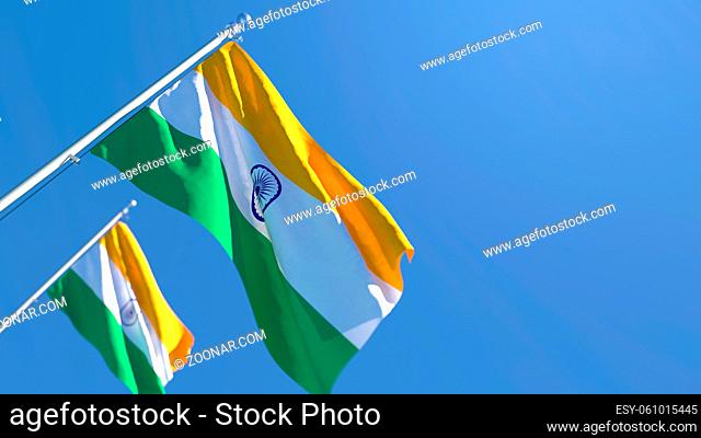 3D rendering of the national flag of India waving in the wind against a blue sky