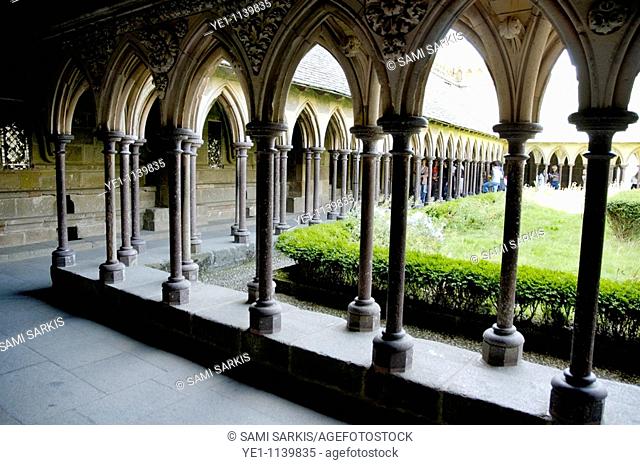 Cloisters and courtyard garden at Mont Saint-Michel, a fortified medieval monastery on an island in Normandy, France