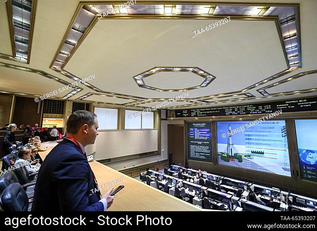RUSSIA, MOSCOW REGION - DECEMBER 1, 2023: The centre's employees watch a live broadcast of the launch of a Soyuz-2.1a rocket booster carrying the Progress MS-25...