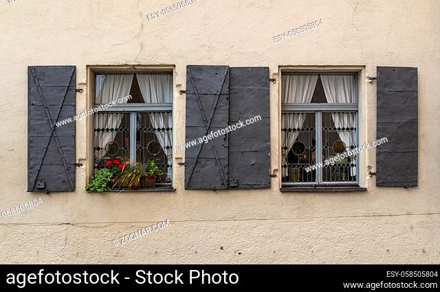 house facade withhistoric windows seen in Straubing, a city of Lower Bavaria in Germany